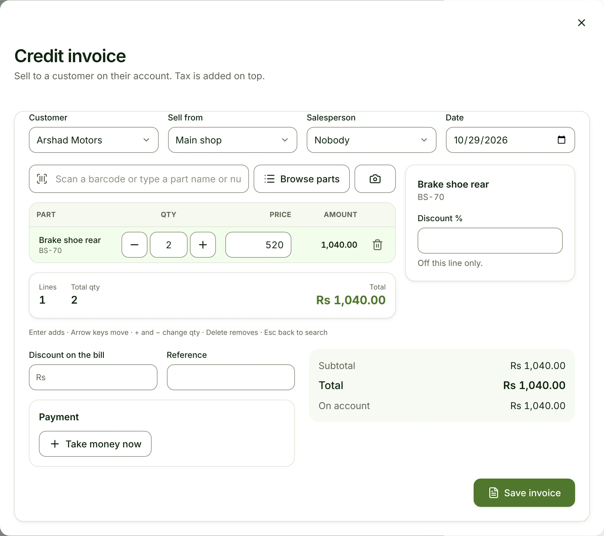 The Sell screen opened by the assistant, prefilled with Arshad Motors and 2 brake shoes on credit